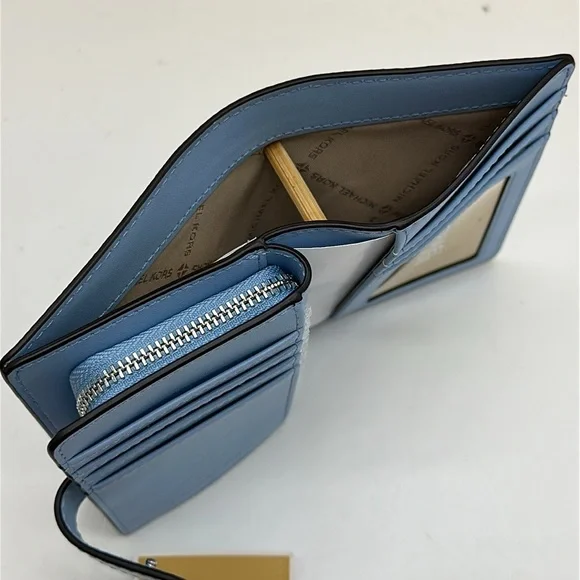 Michael Kors Jet Set Travel Medium Printed Signature Logo Bi-Fold Wallet
LT SKY - Picture 9 of 15